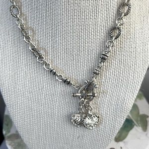 Cool necklace hooks in front by interlocking hearts! Premier Designs original